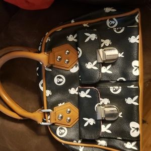 Playboy purse limited edition like 7- inches long 6 inches tall.  Nice size!